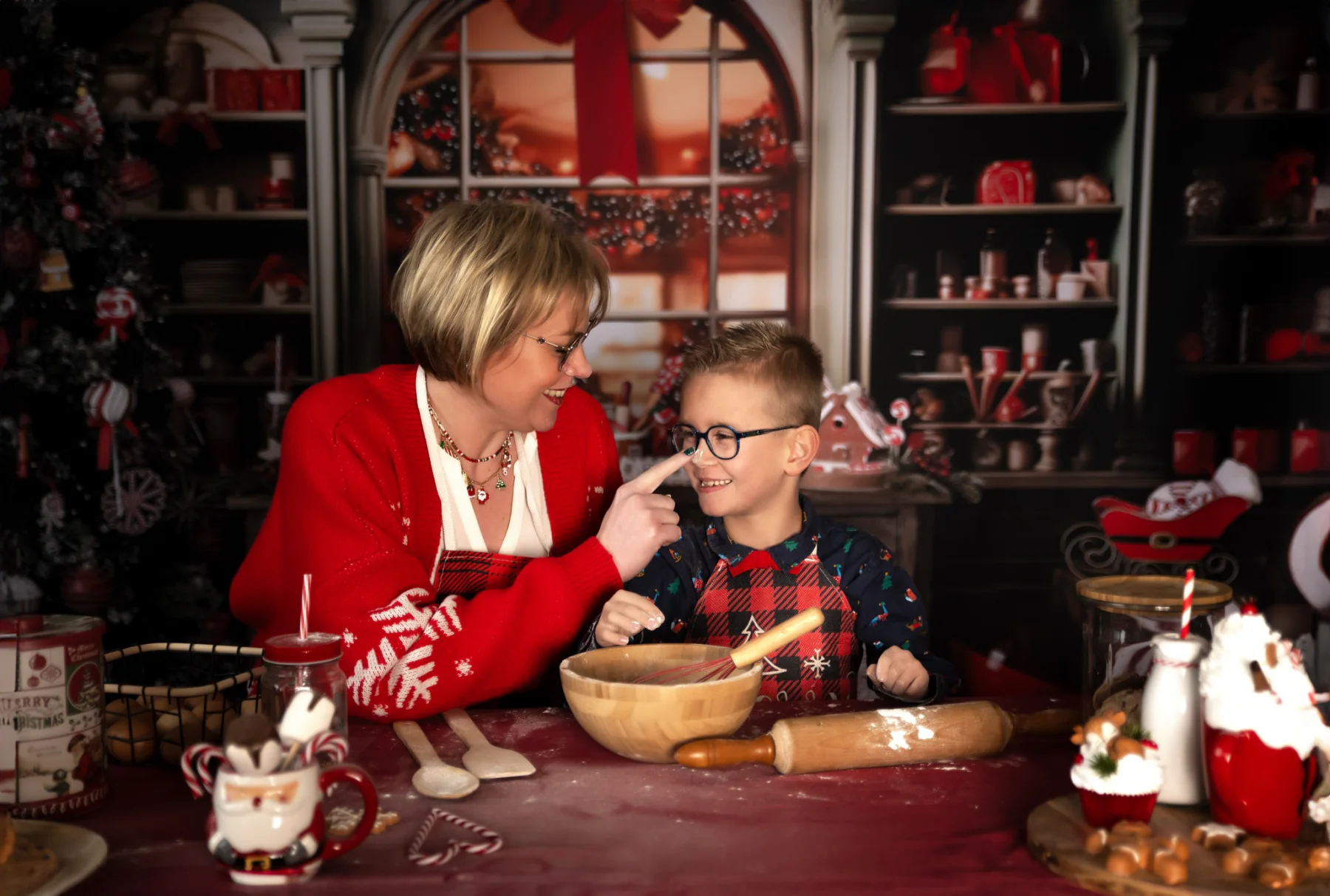 Moment complice en famille pendant une séance de Noël